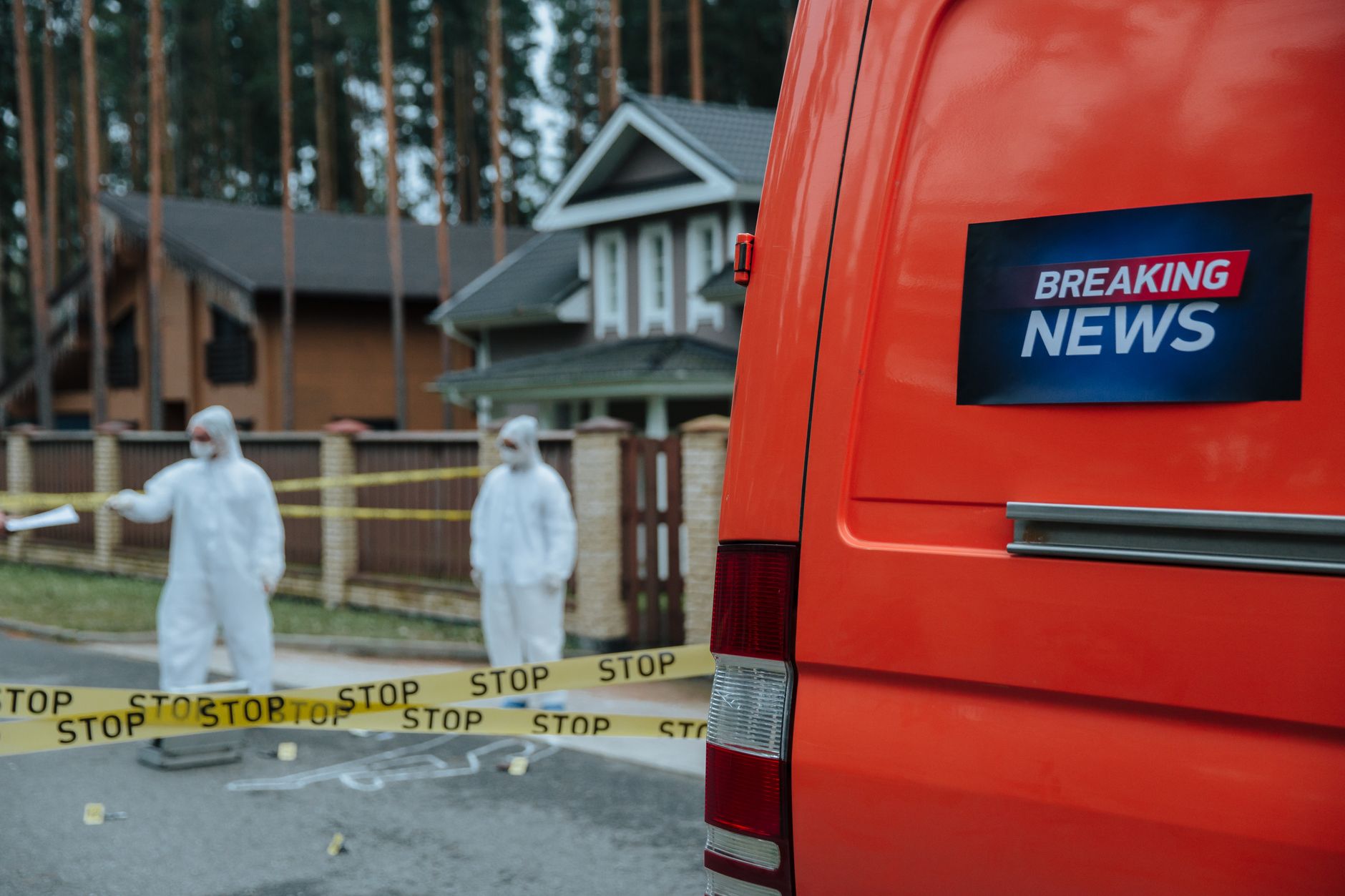 Forensic investigators in protective suits work at a marked-off crime scene near concrete houses. — FelixSpin Casino: Vittori