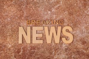 Wooden letters spell 'Breaking News' on a textured, marble-like background. Ideal for newsworthy content. — Sensible Medical
